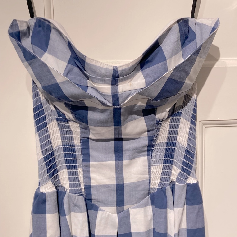 Anthropologie strapless smocked dress with petal accent